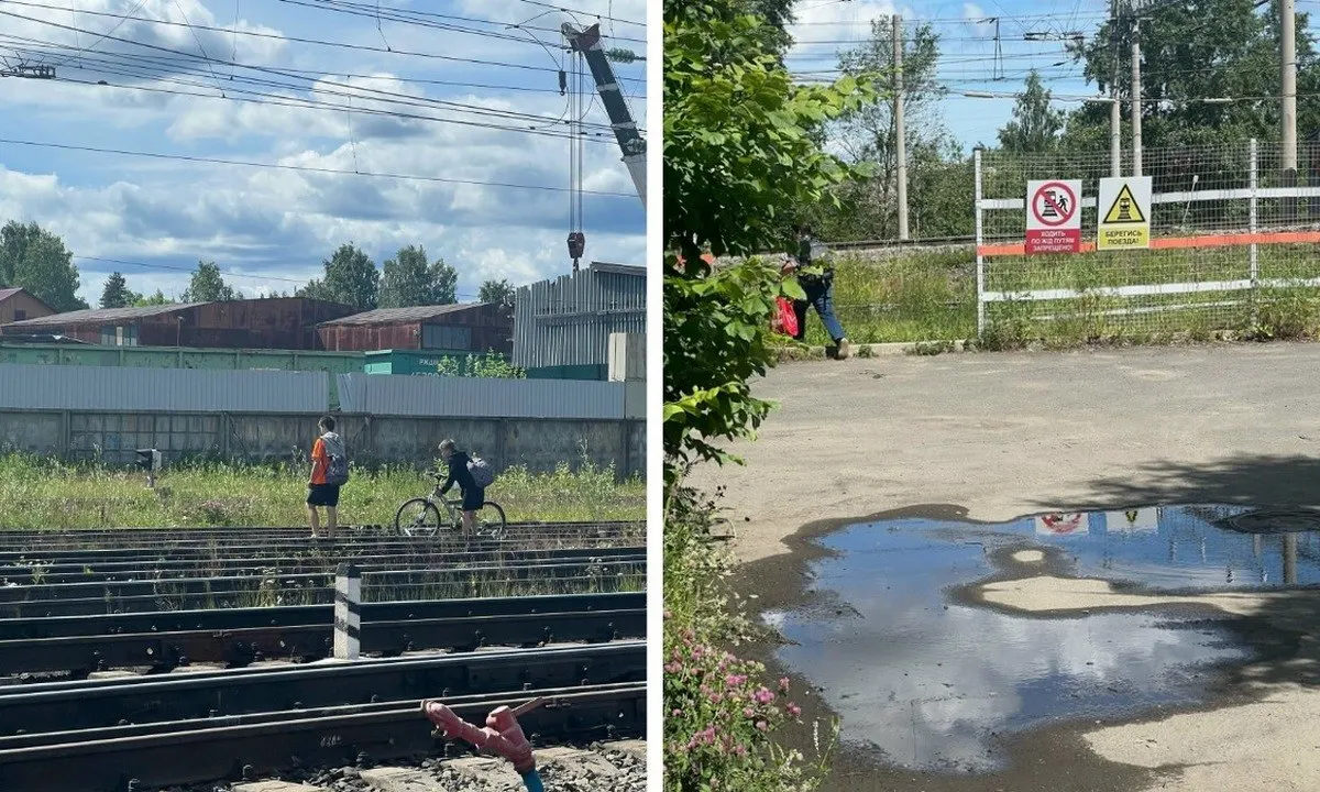 Горожане пробираются через дыру в заборе и переходят пути без настила — в том числе с велосипедами и детьми, из‑за чего место стало особенно опасным.